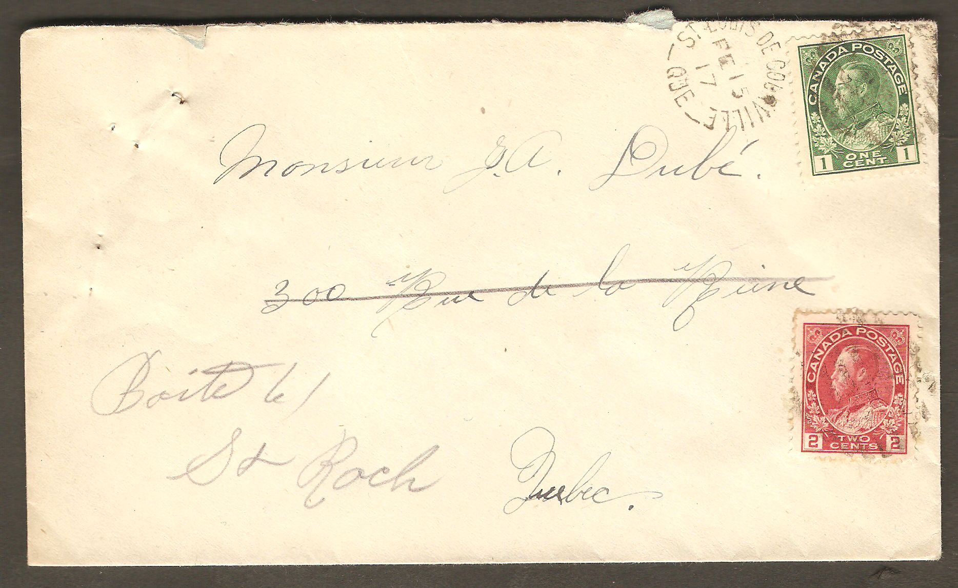 Lettre postée de Courville le 15 février 1917, soit au cours de la Première Guerre mondiale. Son affranchissement se compose de deux timbres de type « Amiral », du roi Georges V. Le  premier, un timbre vert, à 1¢, sert d'affranchissement. Le second, rouge et ayant une valeur de 2¢, sert à payer la taxe de guerre, alors obligatoire.